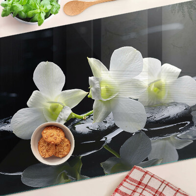 Sklenená doska na krájanie Orchidey na čiernom pozadí