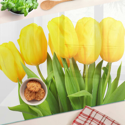 Sklenená doska na krájanie Žlté tulipány na zelenom pozadí