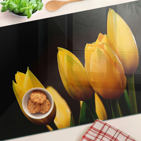 Sklenená doska na krájanie Žlté tulipány na čiernom pozadí