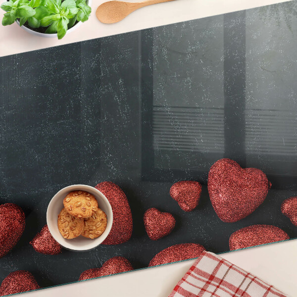 Sklenená doska na krájanie Červené srdcia na tmavom pozadí