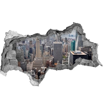 Fototapeta diera na stenu 3D Pohľad na mesto z diery v stene