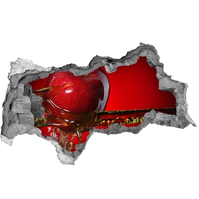 Nálepka 3D diera na stenu Červené jablko v betóne