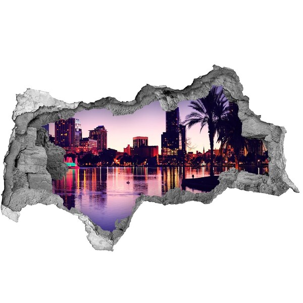 Fototapeta diera na stenu 3D Západ slnka nad mestom