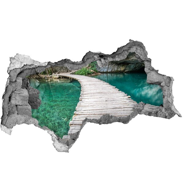 Diera 3D v stene nálepka Tajomný most cez tyrkysovú vodu