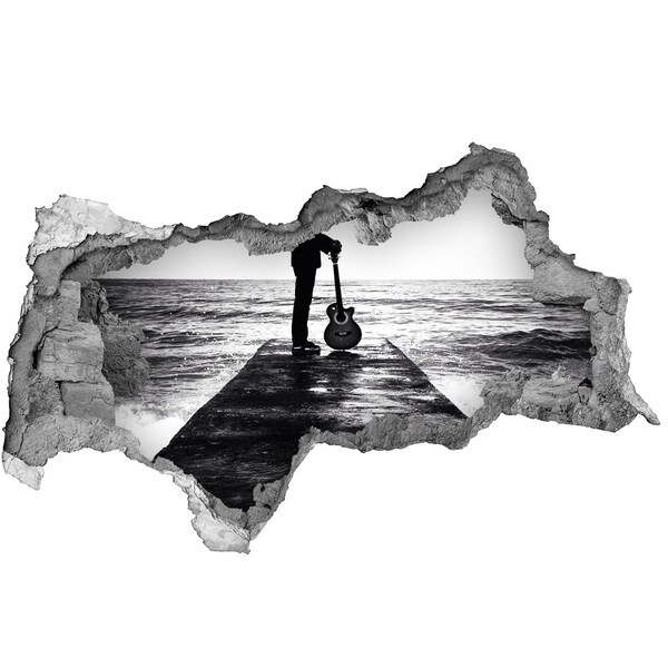 Fototapeta diera na stenu Hudobník na móle