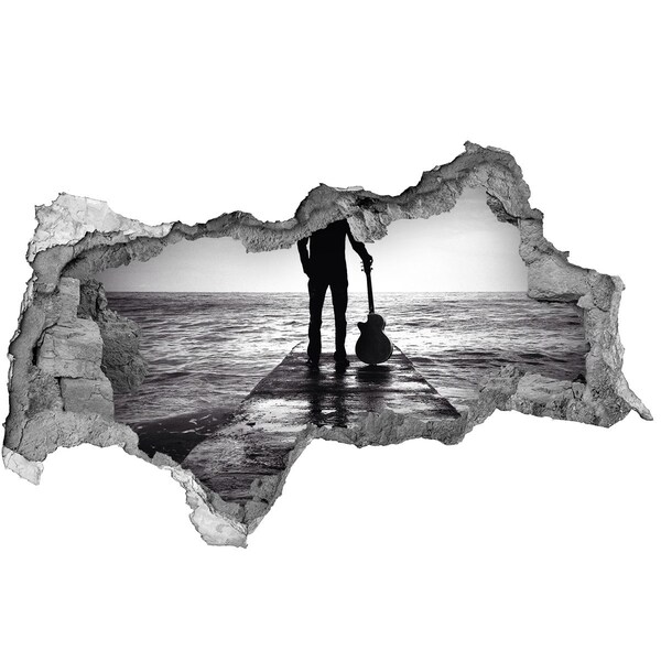 Fototapeta diera na stenu Hudobník na móle