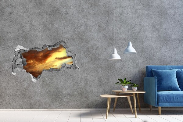 Fototapeta diera na stenu Západ slnka cez dieru v stene