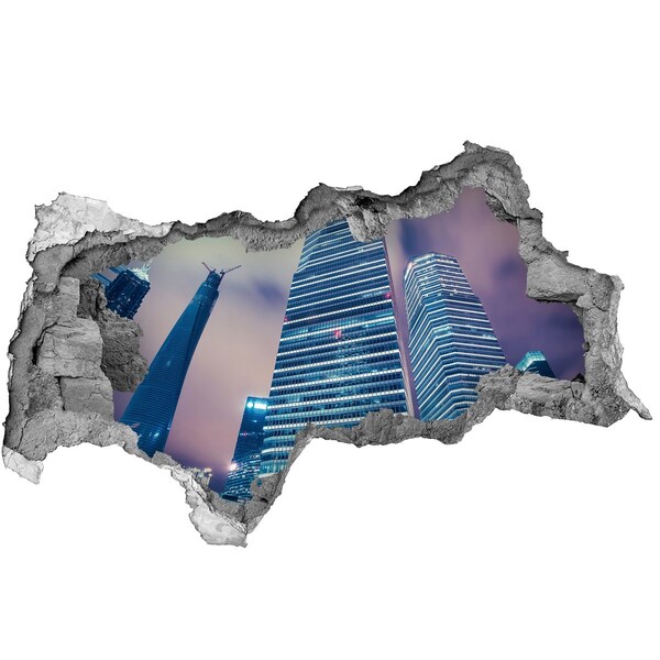 Fototapeta diera na stenu 3D Moderné mesto cez dieru v stene