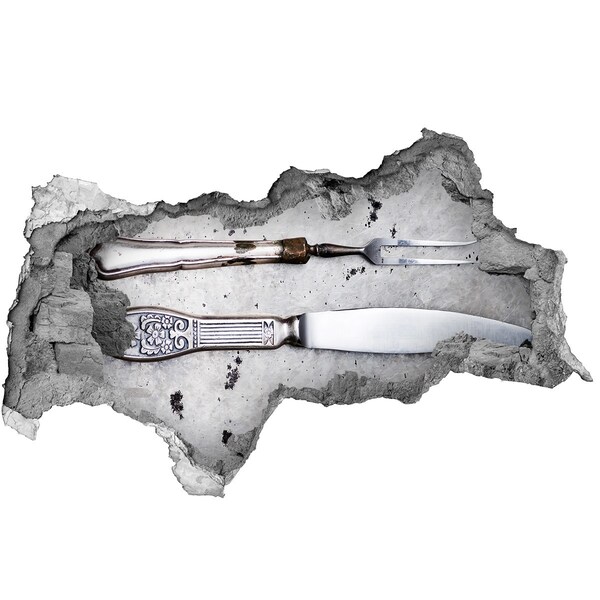 Fototapeta diera na stenu Poškodená stena s kuchynským náradím