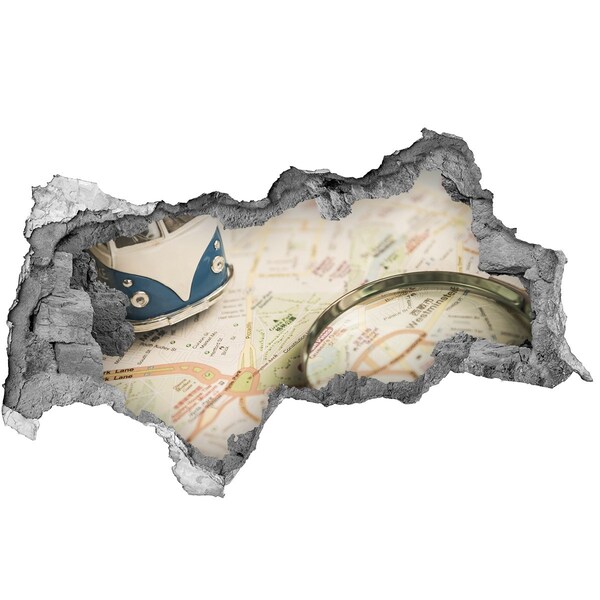 Samolepiaca diera na stenu Mapa s lupou v diere v stene