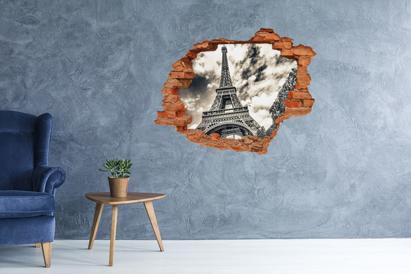 Diera 3D v stene na stenu Eiffelova veža v oblakoch