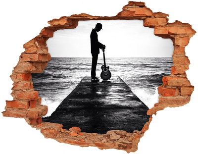 Diera 3D fototapeta na stenu Hudobník na móle