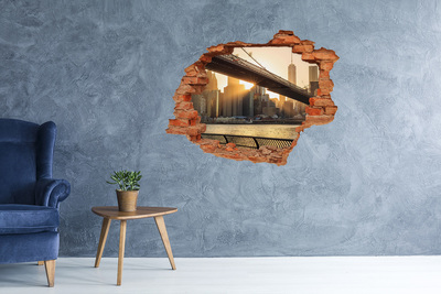 Fototapeta diera na stenu Most v zapadajúcom slnku