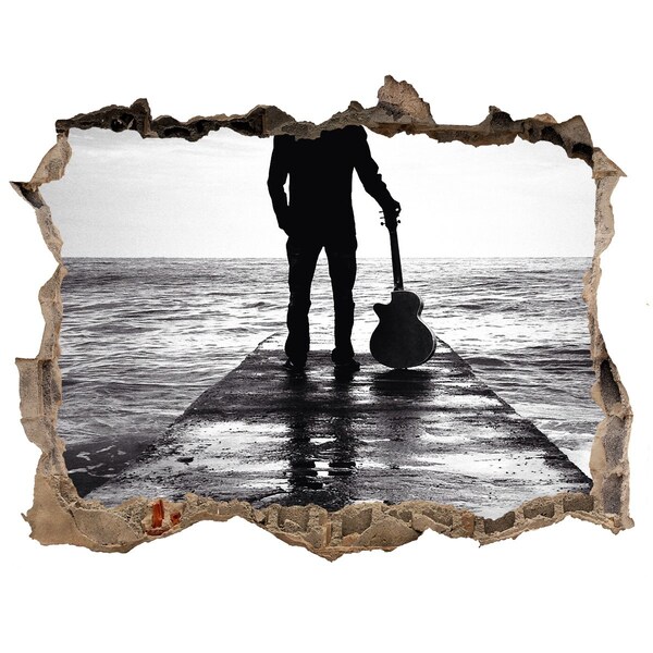 Fototapeta díra na zeď Hudobník na móle