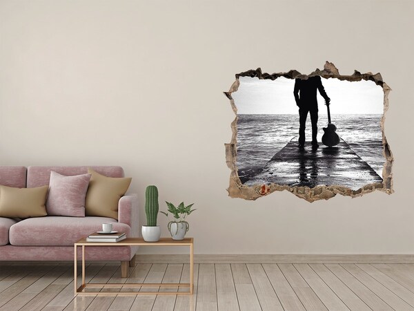 Fototapeta díra na zeď Hudobník na móle