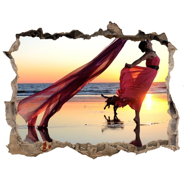 Fototapeta díra na zeď Tanec na pláži pri západe slnka