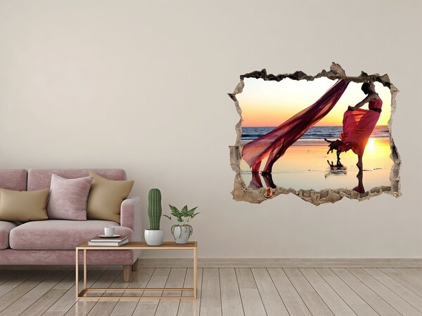 Fototapeta díra na zeď Tanec na pláži pri západe slnka