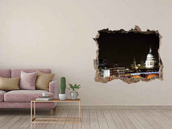 Fototapeta díra na zeď 3D Nočný pohľad na Londýn cez dieru v stene