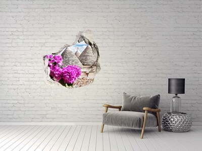 Foto fotografie diera na stenu Trulli v Apúlii s kvetmi