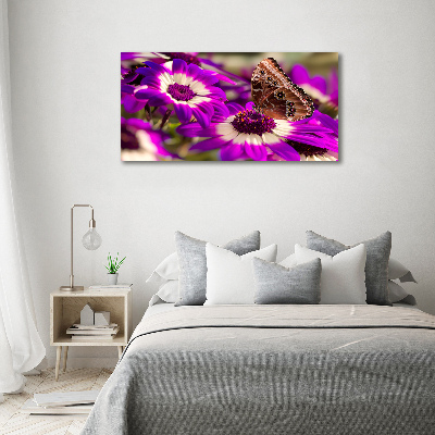 Foto obraz akrylové sklo Motýľ na kvetine