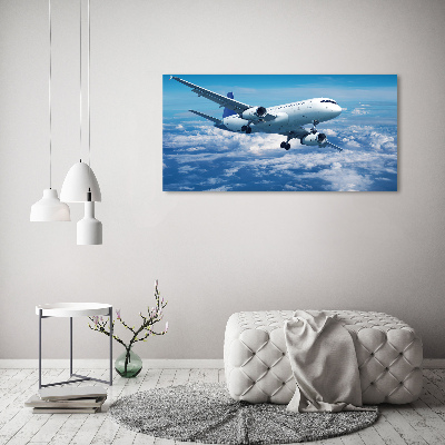 Foto-obraz canvas do obývačky Lietadlo v oblakoch