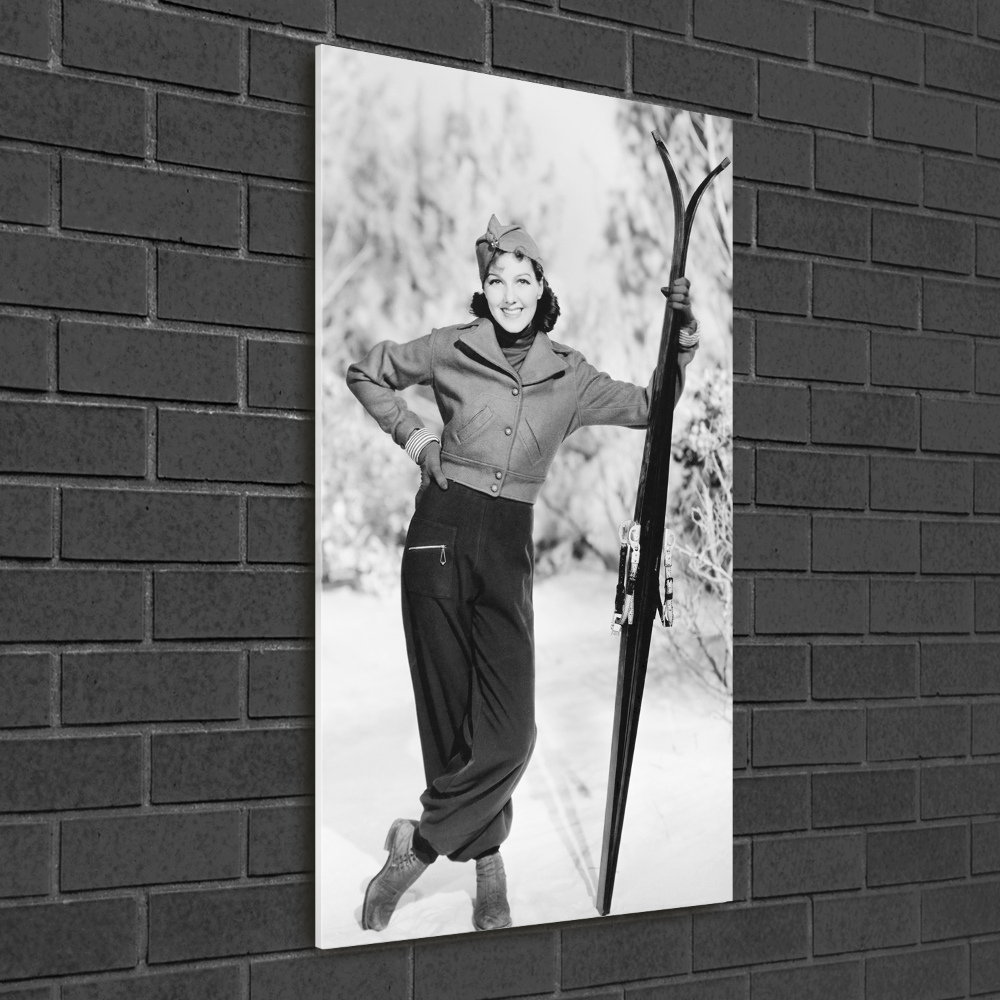 Vertikálny fotoobraz na skle Žena s lyžami