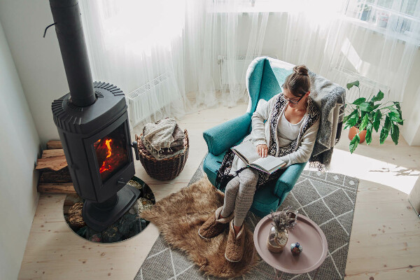 Okrúhla sklenená podložka pod krb Kvetinový motív s motýľmi