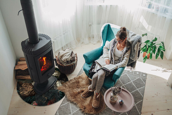 Okrúhla sklenená podložka pod krb Kvetinový motív s motýľmi