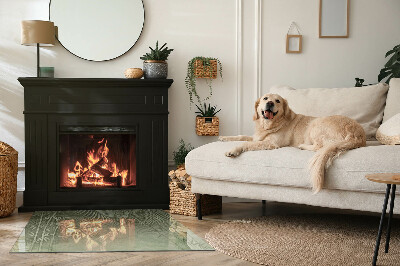 Obdĺžniková sklenená podložka pod krb Tropické listy na pozadí