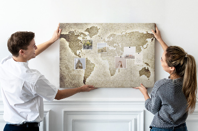 Korková tabuľa Na pozadí je staromódna mapa sveta.