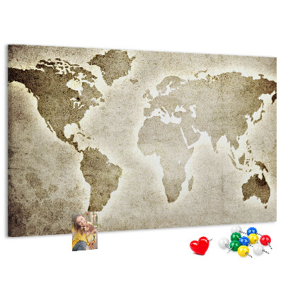 Korková tabuľa Na pozadí je staromódna mapa sveta.