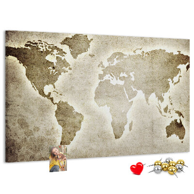 Korková tabuľa Na pozadí je staromódna mapa sveta.