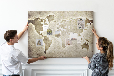 Korková tabuľa Na pozadí je staromódna mapa sveta.