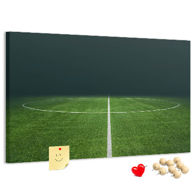 Korková tabuľa Futbalové ihrisko s čiarami a trávou.