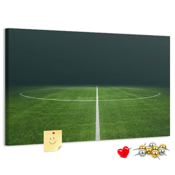 Korková tabuľa Futbalové ihrisko s čiarami a trávou.