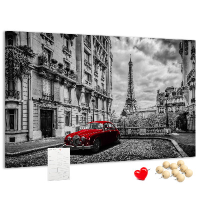 Korková tabuľa Červené auto s Parížom v pozadí